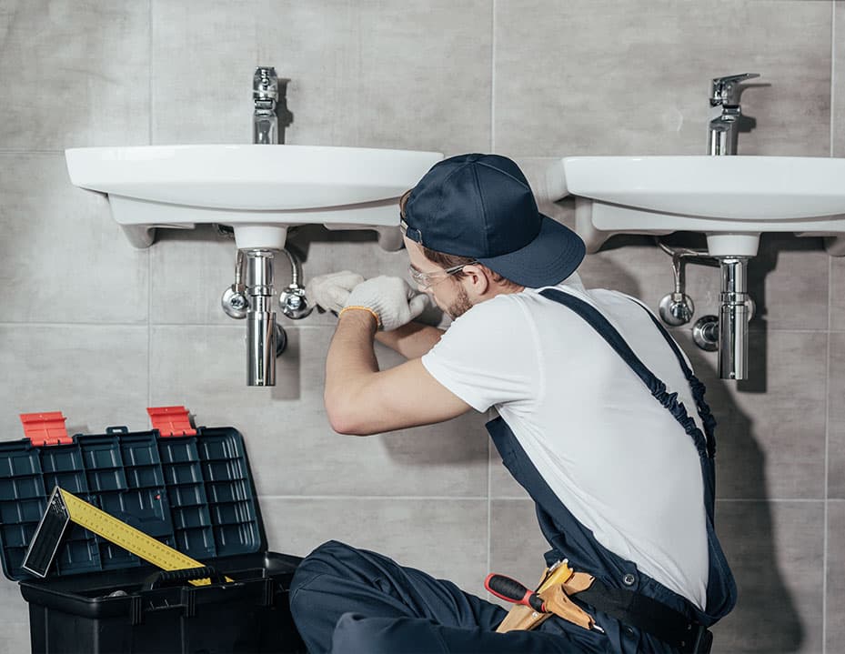 Professional Plumber at Work